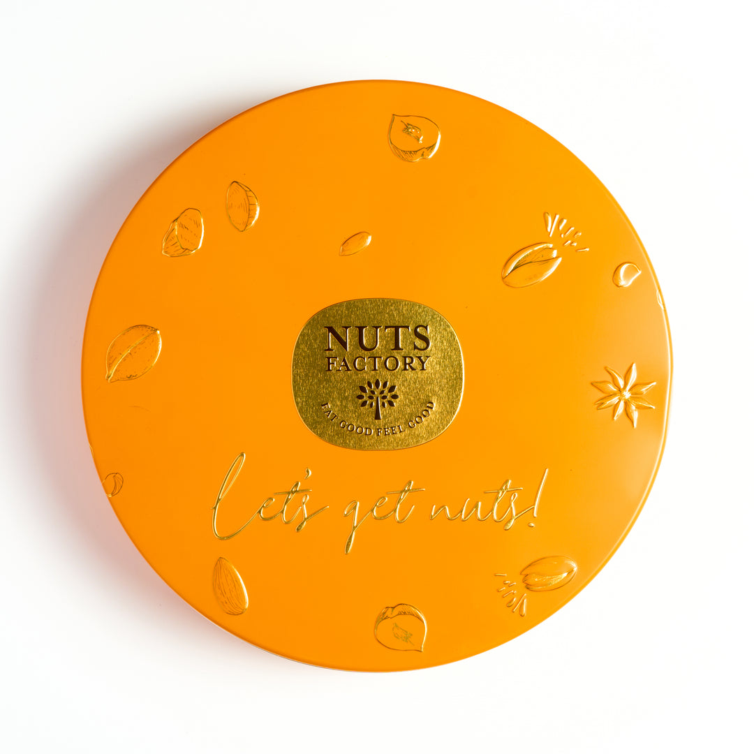 Round Orange Tin Assorted Flavored and Salted Nuts | The Nuts Factory ...